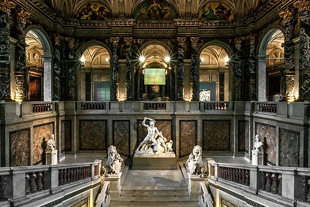 The grand staircase of the Kunsthistorisches Museum with Canova's Theseus